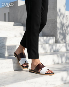 Man walking in Rawan Burgundy White minimalist leather slides for men