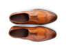 Top angled view of Shelby brogue formal lace-up shoes showing brogue perforation, lace structure, and elegant handcrafted design
