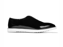 The Vance White black glossy oxford shoe with white sole side profile clean studio product image
