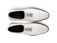 Top view of Welby White brogue lace-up dress shoes showing lace structure, brogue perforation, and clean artisan leather finish